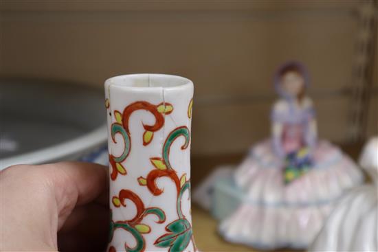 A Chinese blue and white large tripod censer, a peach bloom brush washer and a famille verte vase